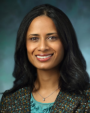 Headshot of Divya Srikumaran