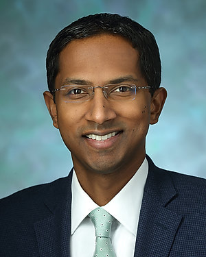 Headshot of Uma Srikumaran