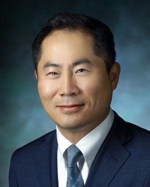 Headshot of Jin U. Kang