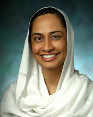 Headshot of Amyna Husain