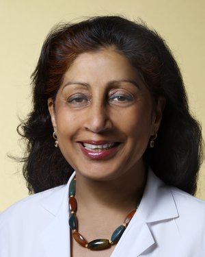 Headshot of Nisha Chandra-Strobos
